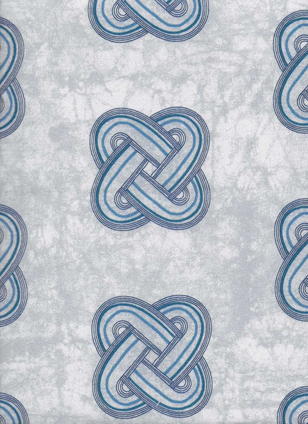 Elegant African upholstery fabric with circular blue tribal pattern in on blue batik base. Interior textile.