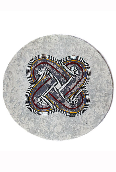 Elegant African rug with circular grey tribal pattern on grey batik base handwoven in Nepal