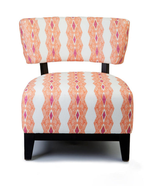 Accent Chair with a bold patterned fabric cover on a white background