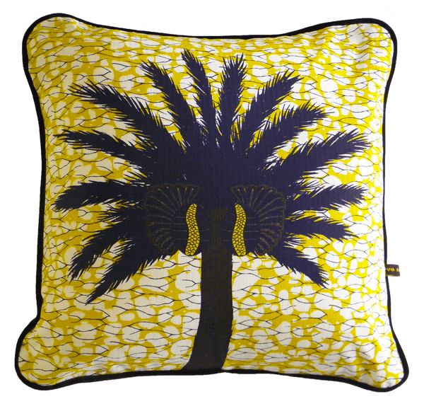 Colourful and bold yellow African batik print cushion with large tropical palm tree  