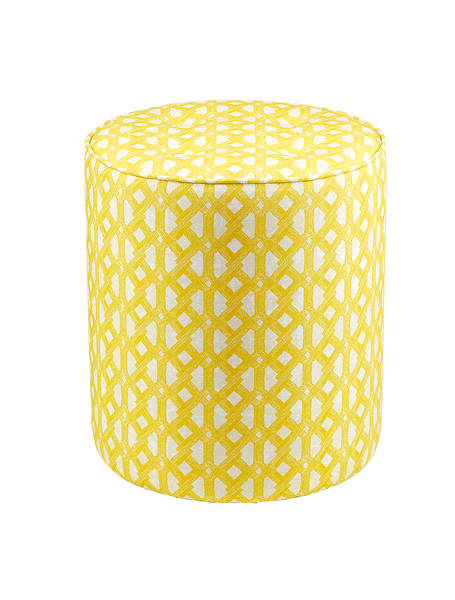 Bright yellow pouffe with geometric African print pattern
