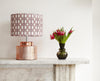 Elegant African batik print lampshade with pink bold geometric pattern