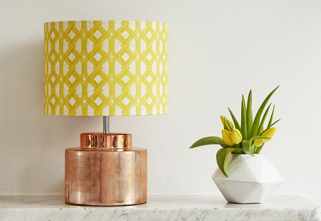 Elegant African batik print lampshade with bright yellow geometric pattern