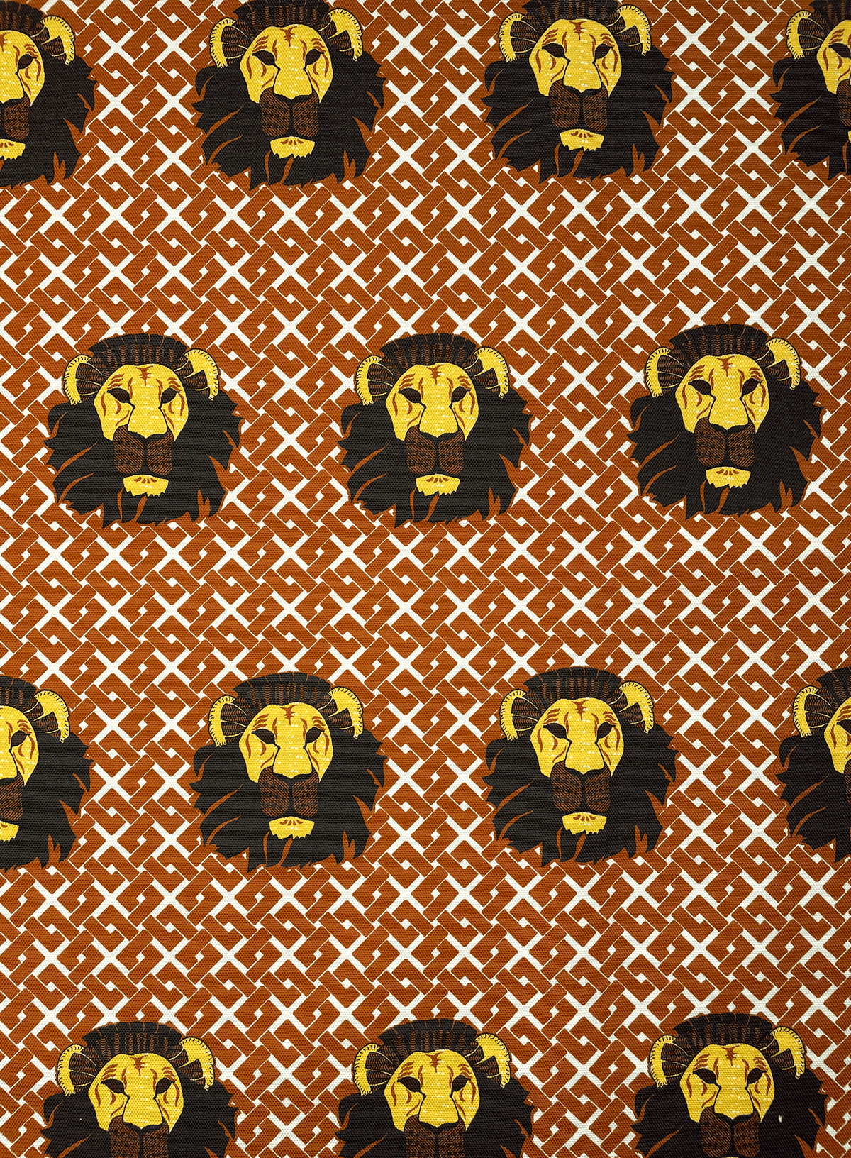 African Oba Interior Fabric in Brown with Lions Head Design | Eva Sonaike
