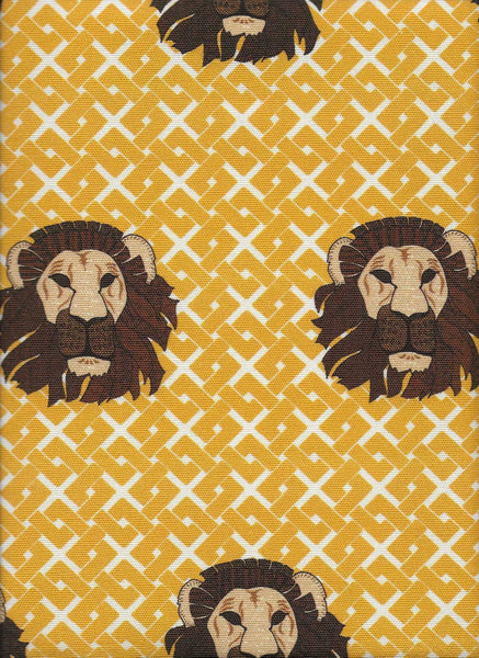 African Lion head upholstery fabric with yellow geometric pattern. Interior textile.