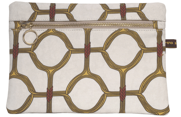 Elegant African print makeup bag with yellow geometric circular pattern and gold zip