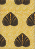 Vibrant yellow African interior fabric with heart shaped pattern on polka dot background. Interior textile.