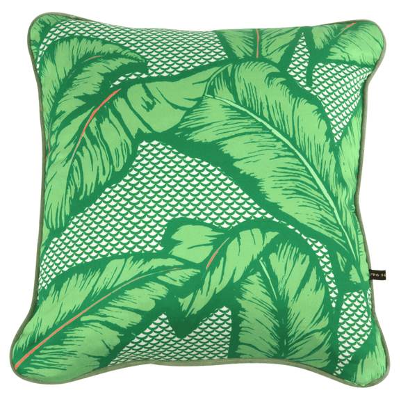 Vibrant African cushion with bold green palm leaf design