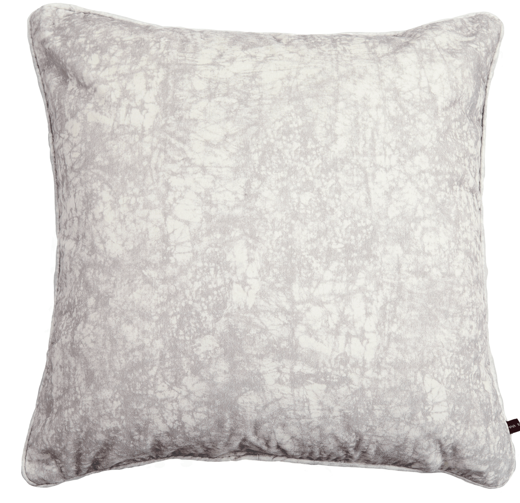 Elegant African cushion with batik pattern in a soft velvet