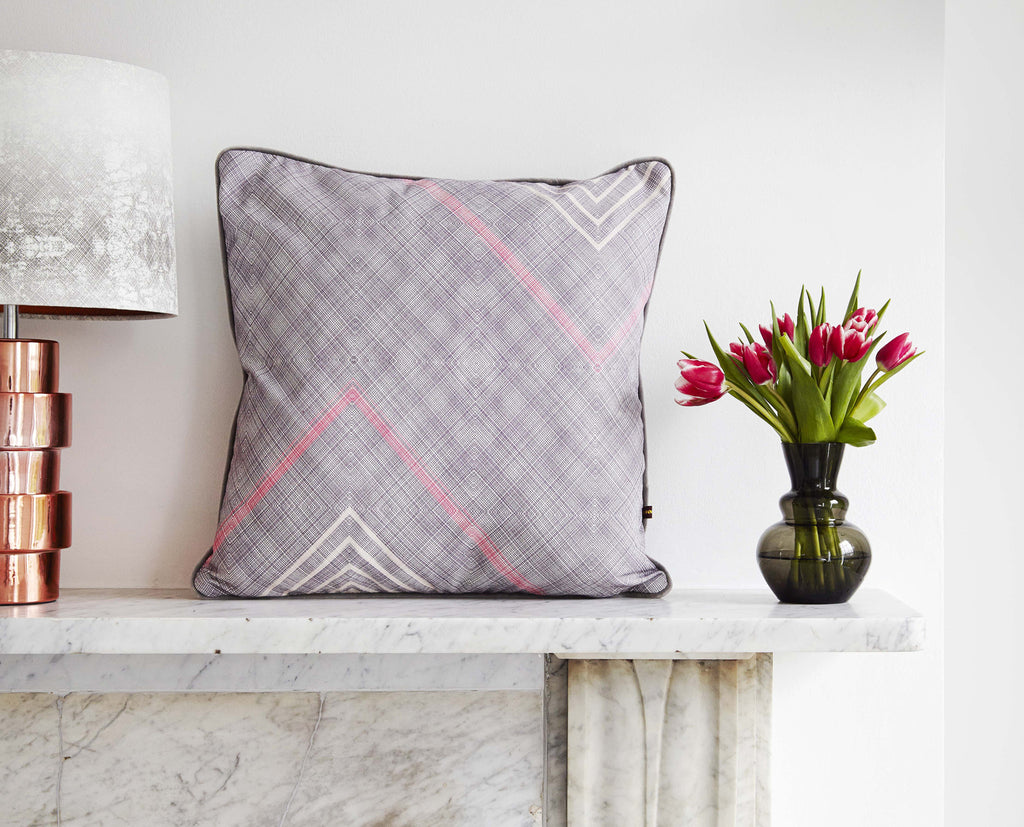 Purple African cushion with geometric pattern